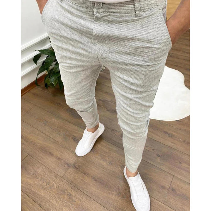 Eleganckie męskie spodnie Bartosz, modny krój slim fit. Wygodne spodnie na co dzień, do biura i na jesień.