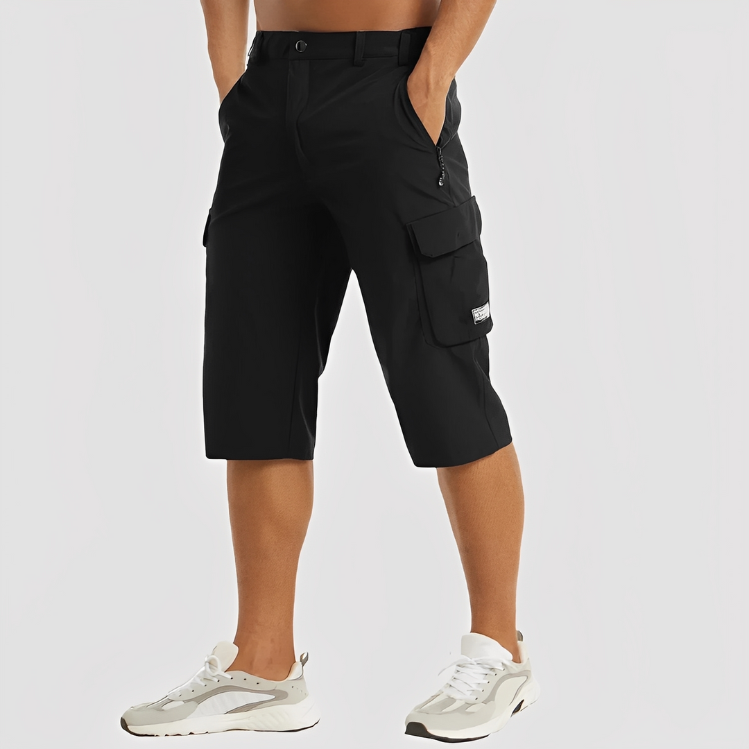 Stylowe męskie spodnie cargo, rozciągliwe. Łatwe do stylizacji, idealne na casualowe wyjścia i modny look.