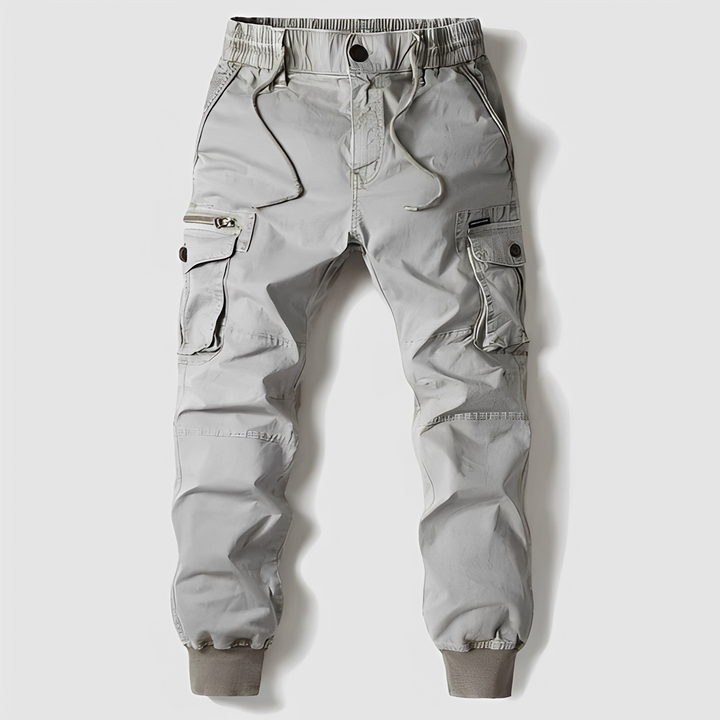 Komfortowe męskie spodnie cargo streetwear z elastycznymi nogawkami. Idealne do stylizacji casualowych.