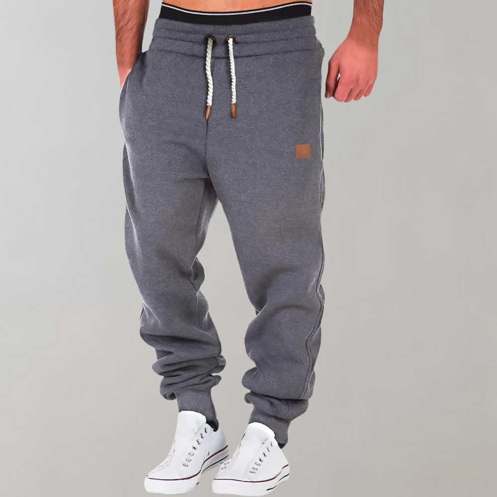 Stylowe męskie spodnie dresowe Éric. Casualowe joggery sportowe, doskonałe do codziennych stylizacji. Wygoda i styl.