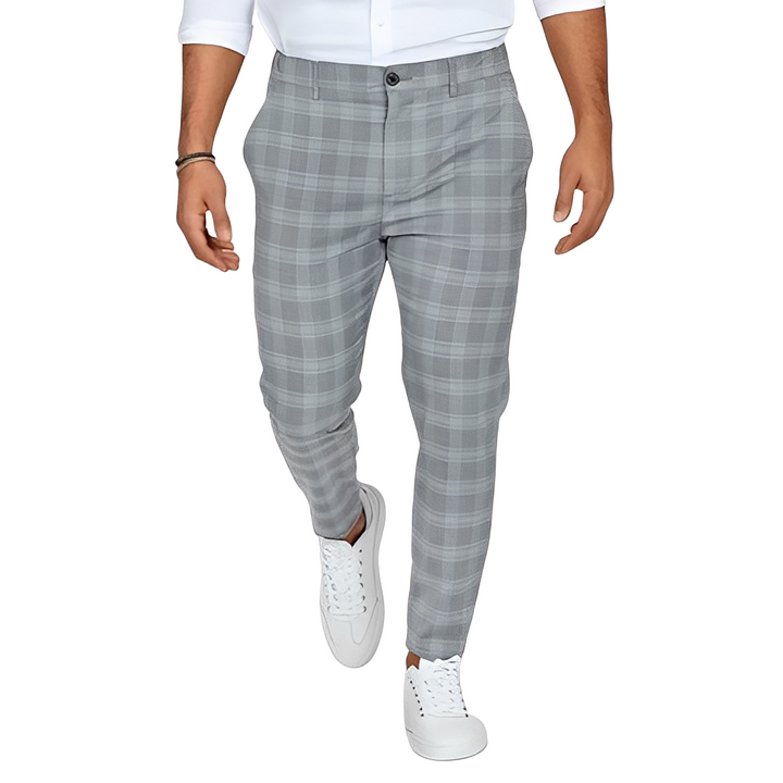 Męskie spodnie slim-fit w kratę, eleganckie i dopasowane, idealne do biura lub na co dzień.