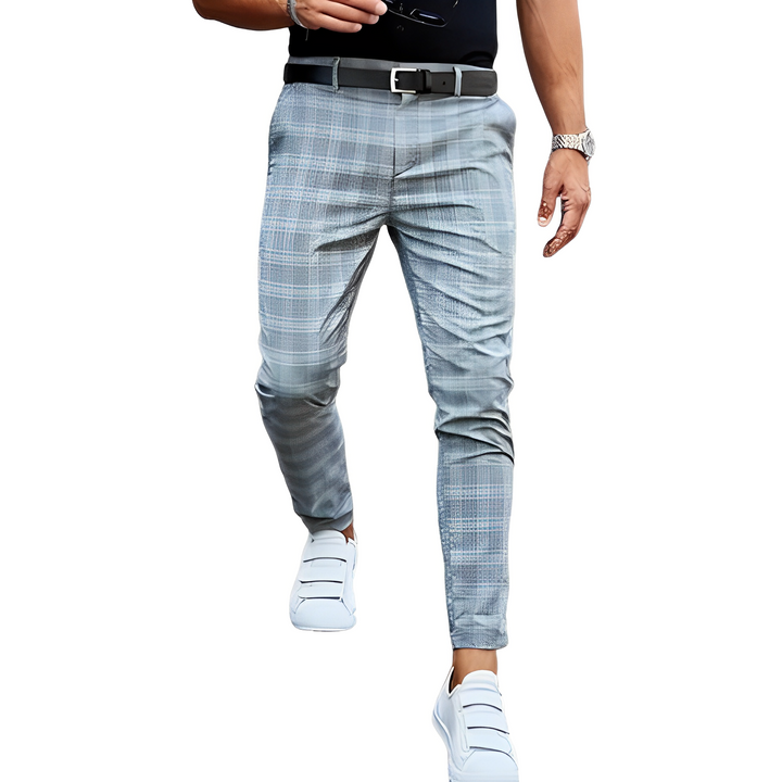 Nowoczesne męskie spodnie slim-fit w kratę, idealne dla modnego mężczyzny, szukającego wygody.