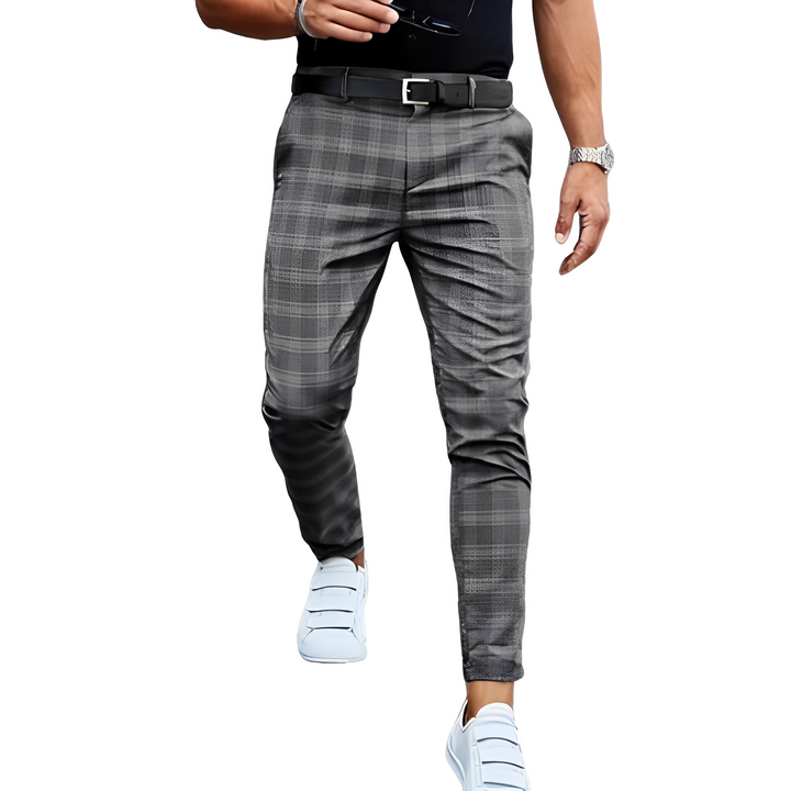 Stylowe męskie spodnie w kratę fason slim-fit, doskonałe do budowania eleganckich stylizacji.