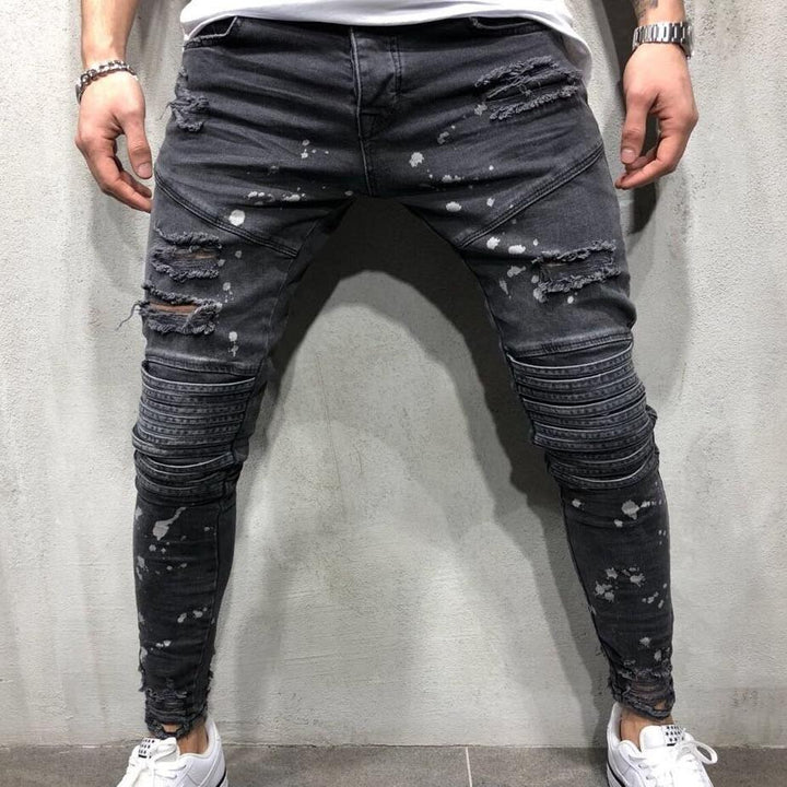 Modne męskie jeansy slim fit w kolorze szarym, wygodne, z przetarciami, podkreślające styl uliczny.