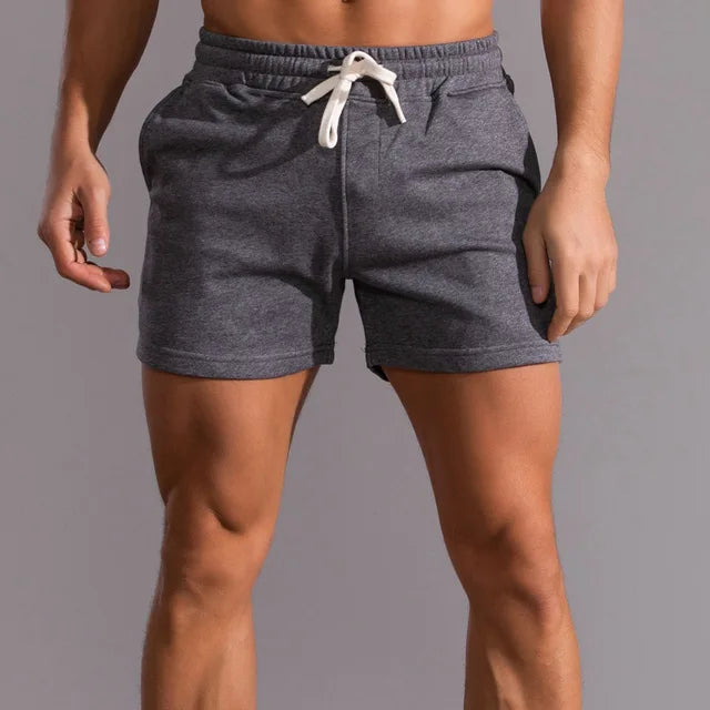 Sportowe szorty męskie jogger, idealne do casualowych stylizacji. Wygodne krótkie spodenki na lato.