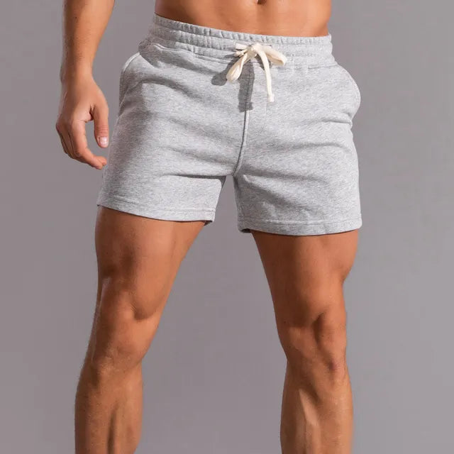 Komfortowe szorty jogger męskie, modne krótkie spodenki z kieszeniami. Idealne do miejskich stylizacji.
