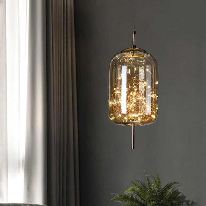 Designerska lampa wisząca Wróżki ze szklanym kloszem. Nowoczesne oświetlenie wnętrz.