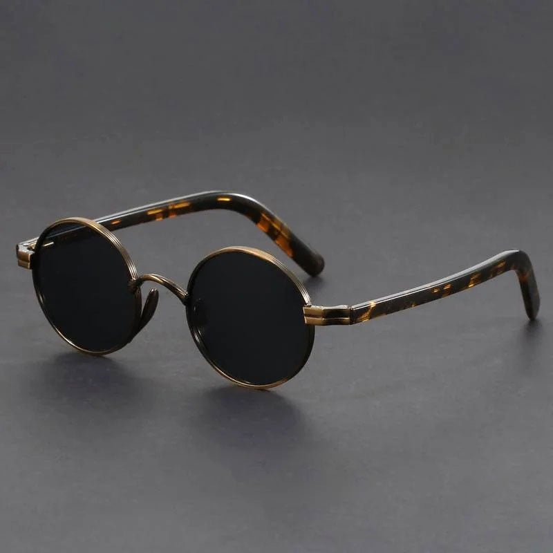 Eleganckie okrągłe okulary przeciwsłoneczne z metalową oprawą