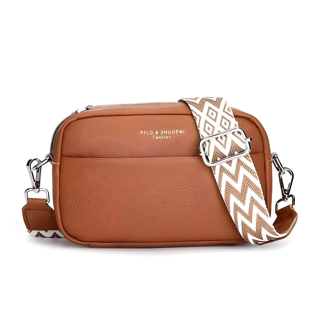 Jasnobrązowa damska torba crossbody z ozdobnym wzorzystym paskiem