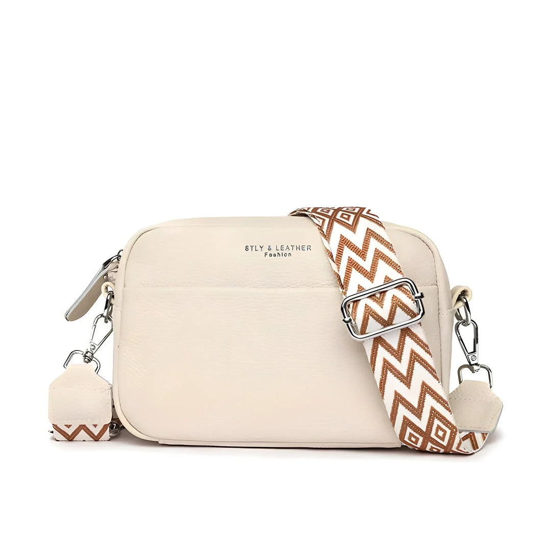 Beżowa damska torba crossbody z regulowanym paskiem w geometryczny wzór