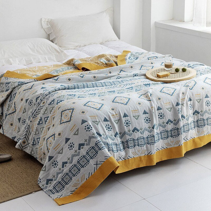 Koc japoński z wzorem inspirowanym kimono, unikalny element dekoracyjny i komfortowy pled.