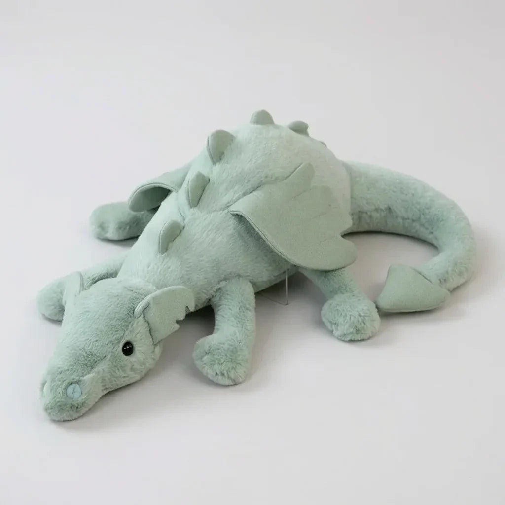 Zielony pluszowy smok CuddleDragon na jasnym tle