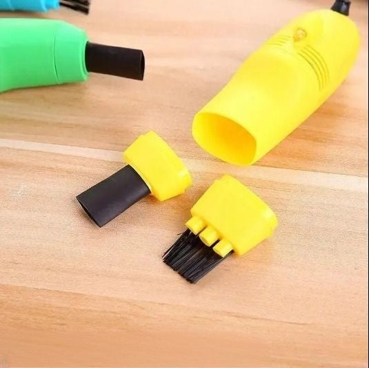 Przenośny odkurzacz mini zasilany przez USB. Idealny do sprzątania biurka, klawiatury i małych przestrzeni.
