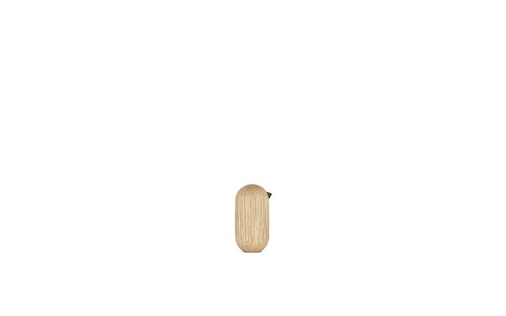 Stylowa figurka ptaszka z drewna, minimalistyczna ozdoba w nowoczesnym designie.
