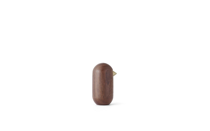 Prezent – minimalistyczna drewniana figurka ptaszka, nowoczesna dekoracja.
