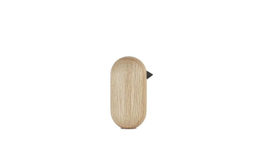 Unikatowa figurka ptaszka z drewna, minimalistyczny design dla nowoczesnego wnętrza.