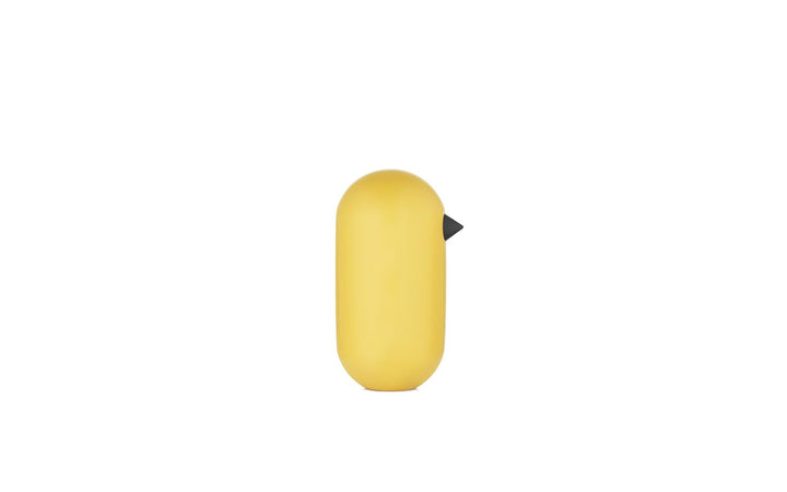 Prosta, a zarazem elegancka figurka ptaszka z drewna, minimalistyczna dekoracja.