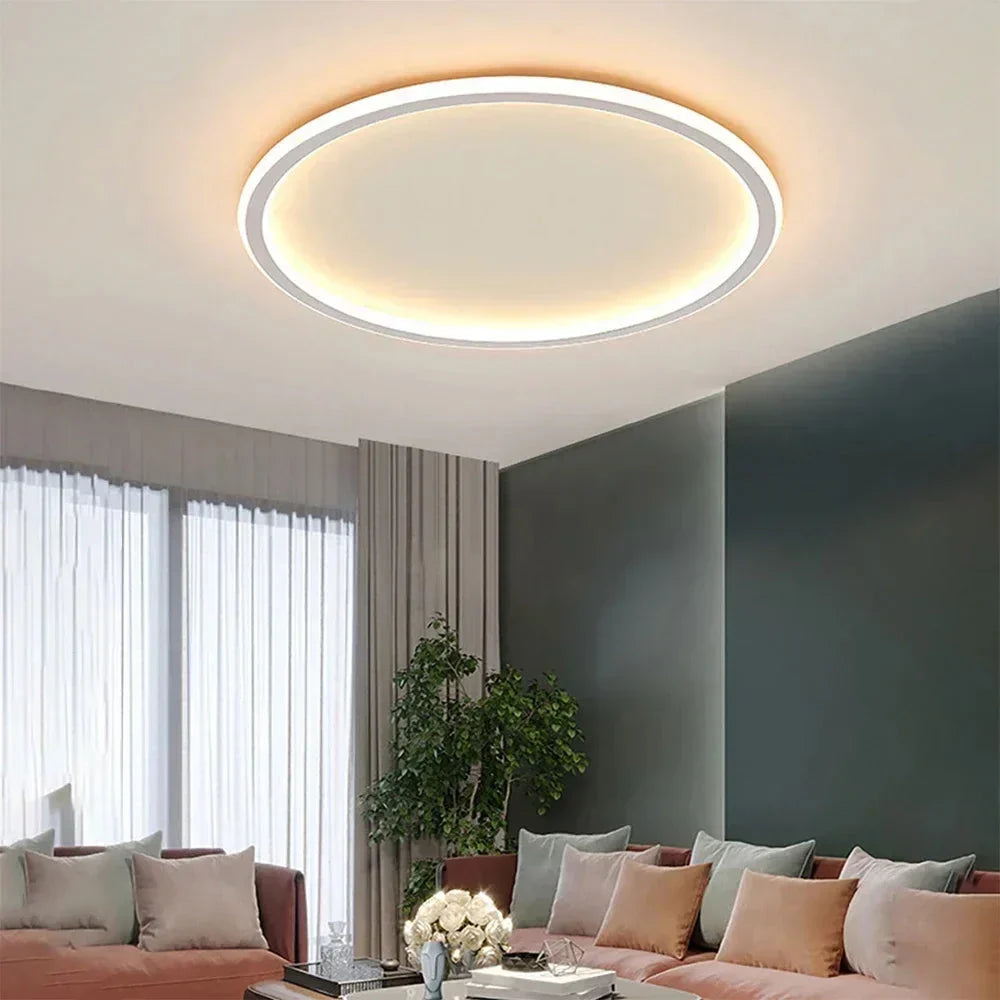Nowoczesna lampa sufitowa LED o minimalistycznym, okrągłym designie. Idealne oświetlenie do salonu lub sypialni.