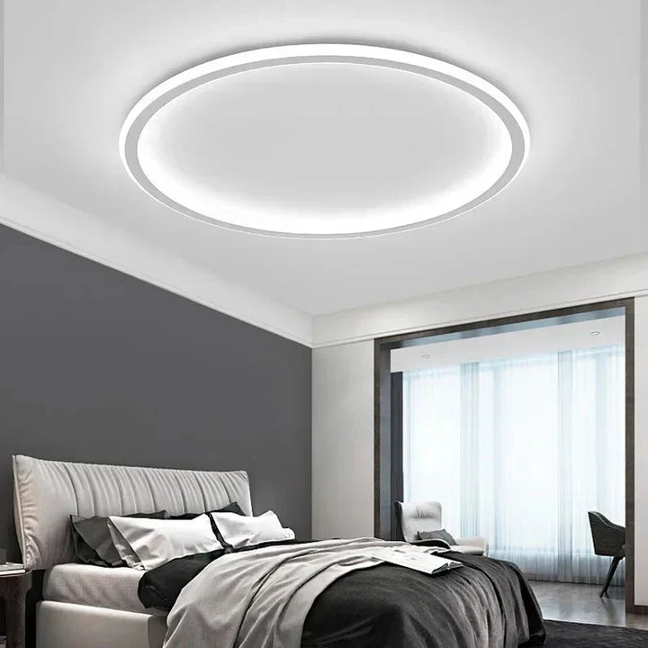 Minimalistyczna lampa sufitowa LED do sypialni, okrągła. Skandynawski design, jasne oświetlenie wnętrz.