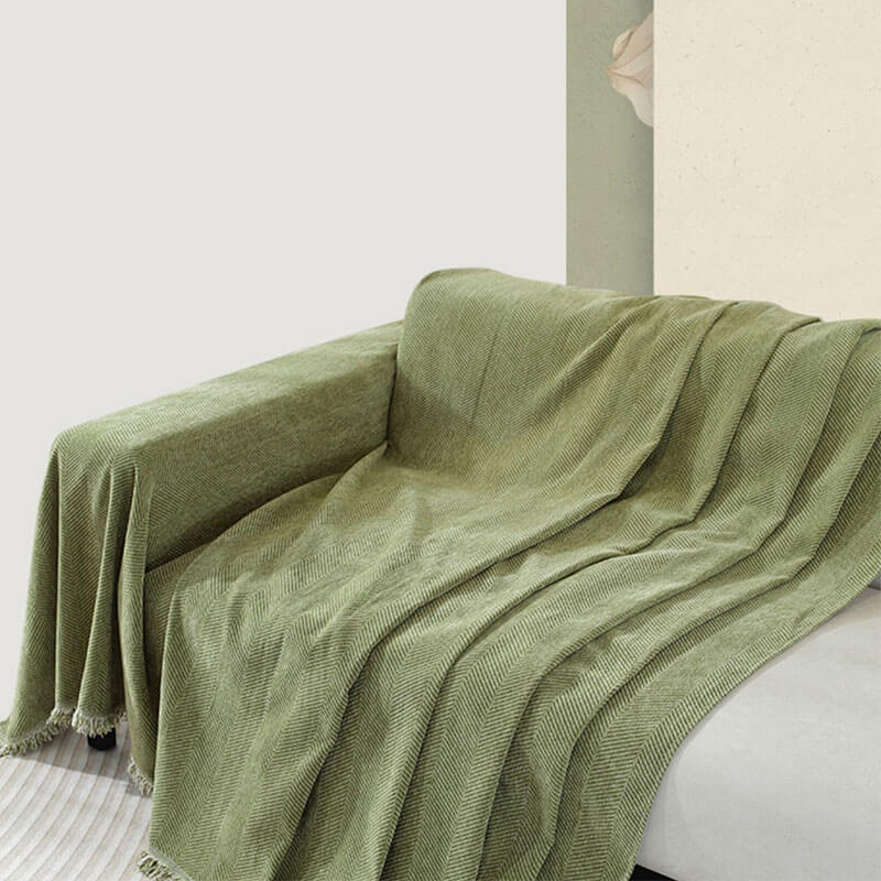 Nowoczesna narzuta na kanapę, design jodełki, z frędzlami, do salonu i sypialni.