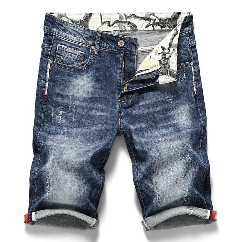 Niebieskie męskie szorty jeansowe slim fit na lato. Wygodne i stylowe krótkie spodenki męskie casualowe.