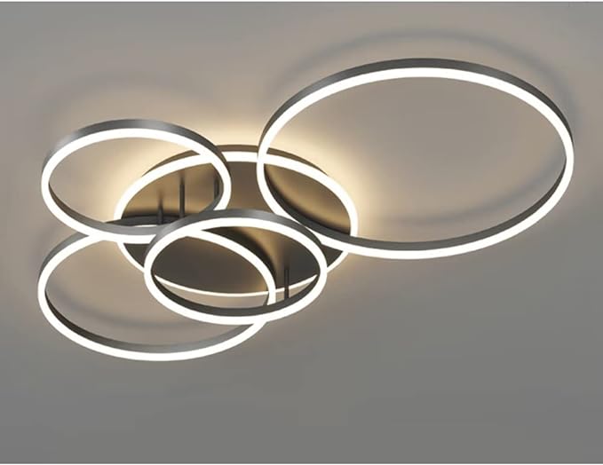 Gładka, czarna powierzchnia okrągłej lampy sufitowej LED. Nowoczesny design, łatwa w montażu.