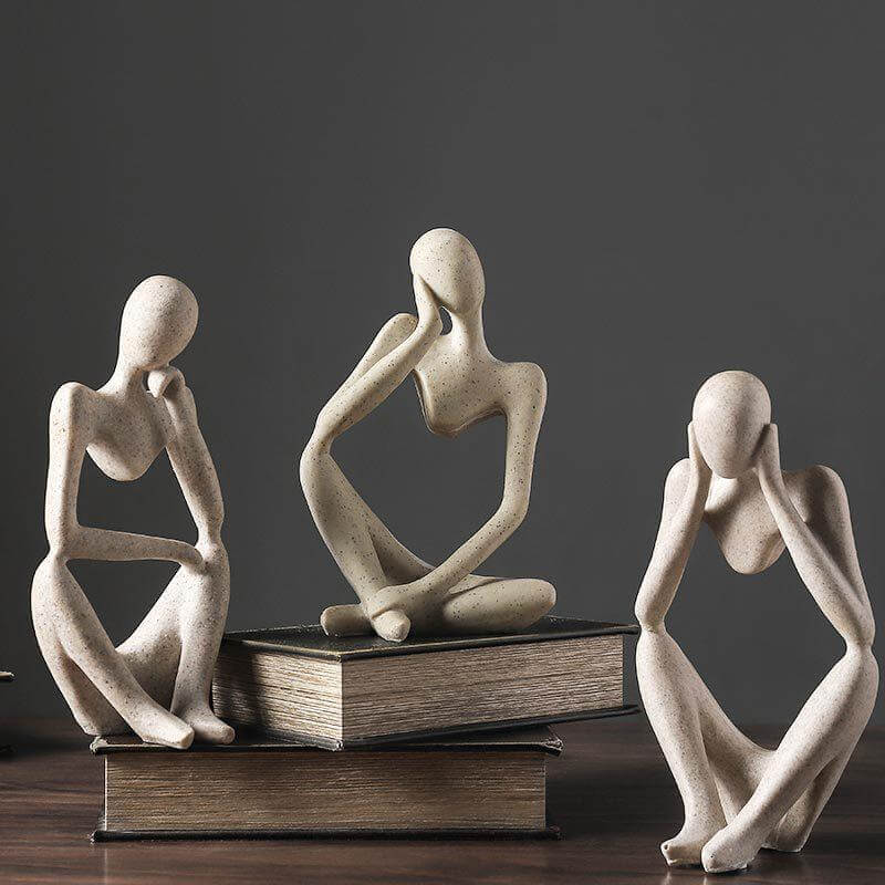 Elegancka figurka "Myśliciel", doskonały prezent dla miłośnika sztuki i nowoczesnego designu wnętrz.