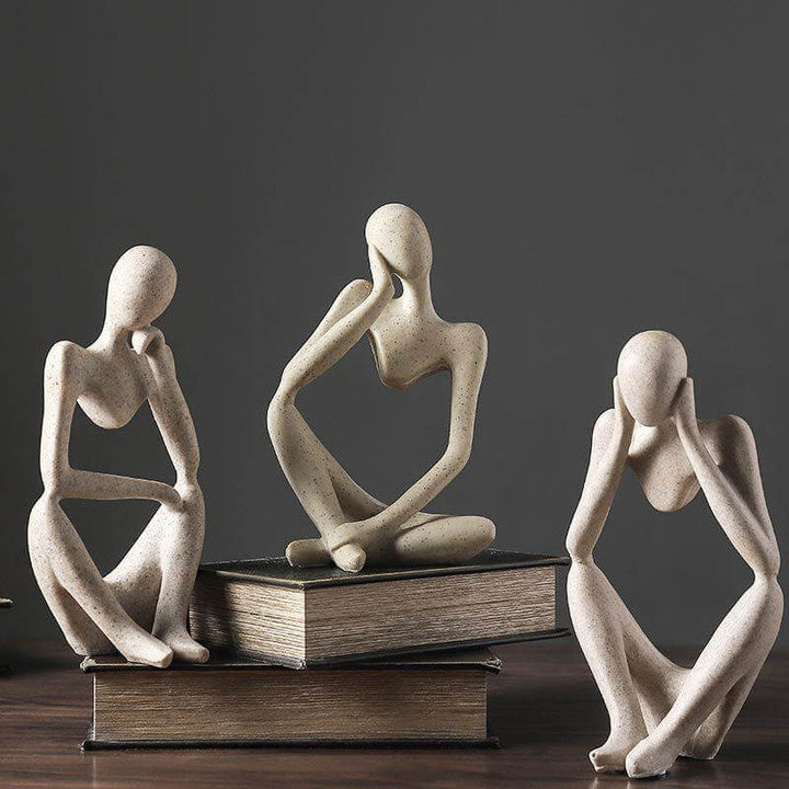 Elegancka figurka "Myśliciel", doskonały prezent dla miłośnika sztuki i nowoczesnego designu wnętrz.