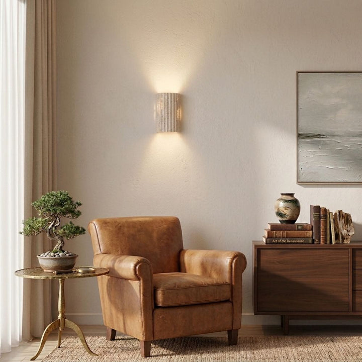 Nowoczesna lampa LED ścienna rozświetlająca wnętrza subtelnym, ciepłym światłem. Designerski kinkiet.