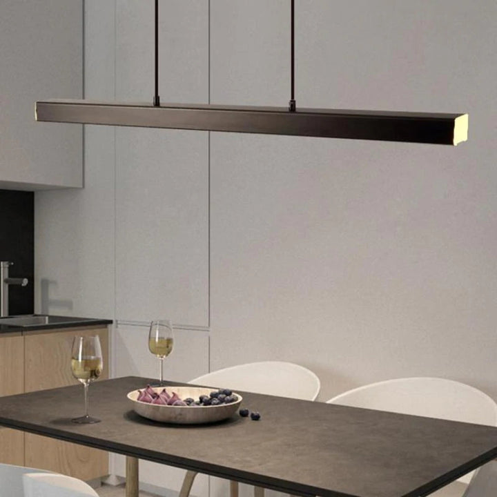 Elegancka lampa wisząca liniowa LED. Nowoczesne oświetlenie sufitowe do salonu.