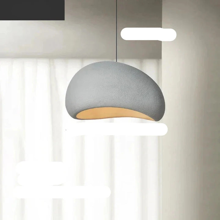Lampa wisząca z żywicy LED, emitująca ciepłe światło, nowoczesne oświetlenie do sypialni.