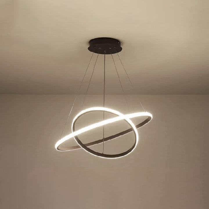Designerska lampa wisząca LED z układem pierścieni, nowoczesne oświetlenie sufitowe do jadalni.