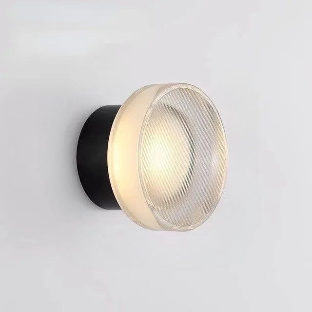 Elegancka, okrągła lampa ścienna LED. Minimalistyczne oświetlenie do salonu i sypialni.