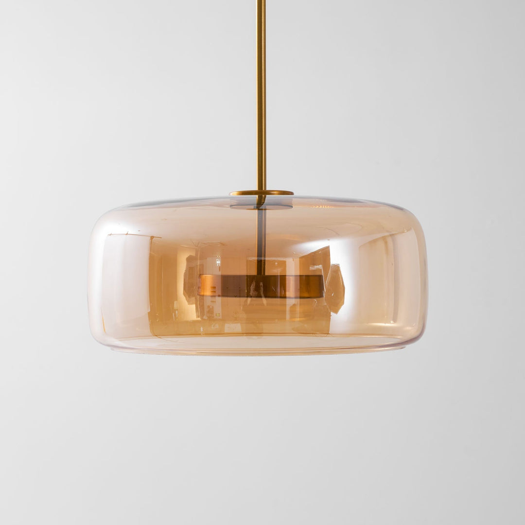 Designerska lampa wisząca LED, szklana, złota, do nowoczesnej sypialni.