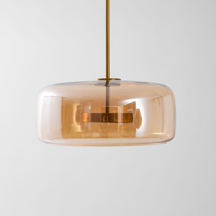 Designerska lampa wisząca LED, szklana, złota, do nowoczesnej sypialni.