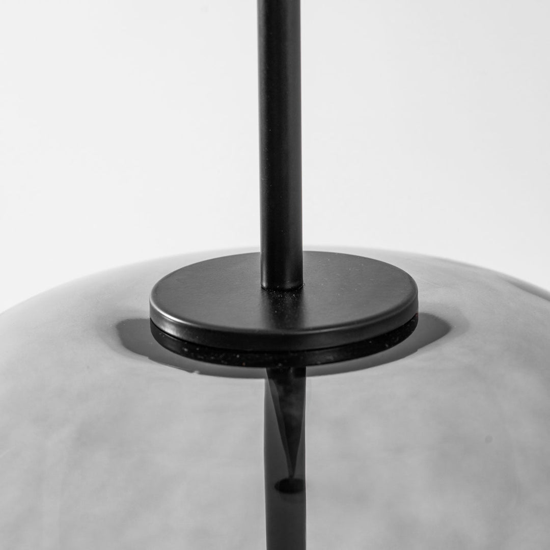 Designerska lampa wisząca LED, szklana, czarna, do nowoczesnego wnętrza.