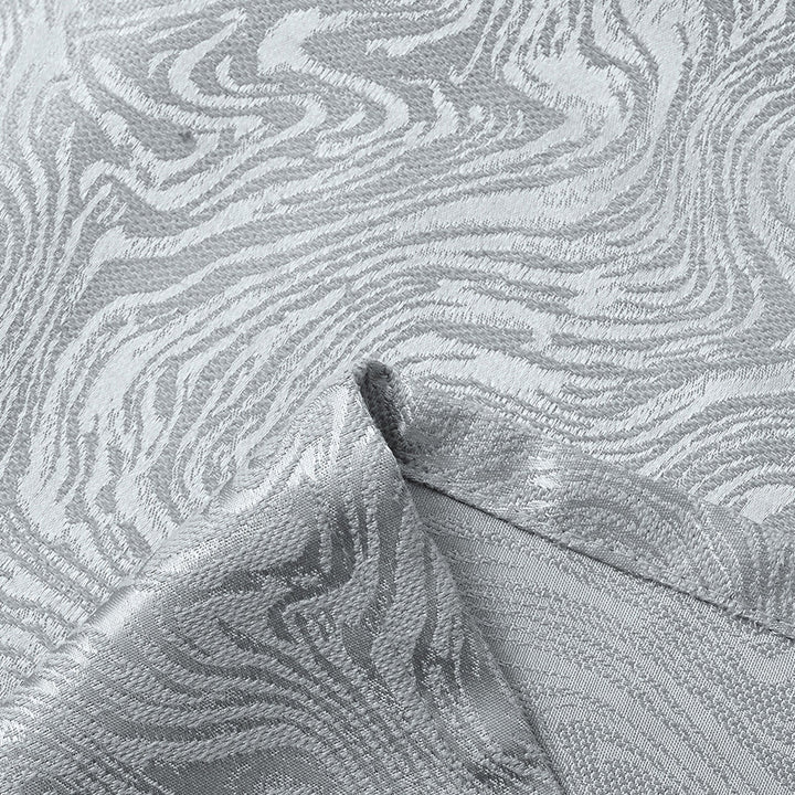 Eleganckie zasłony zaciemniające Modern Texture powieszone w salonie. Nowoczesny styl, chronią prywatność.