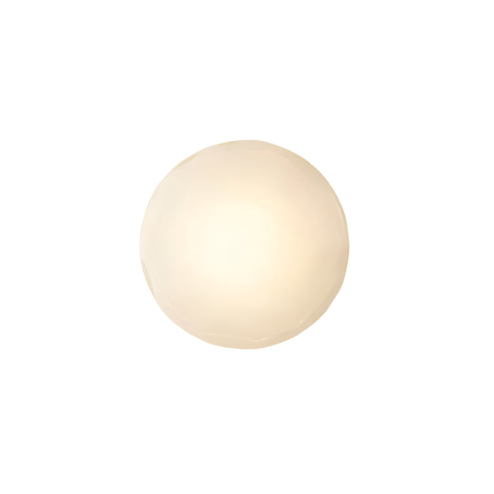 Skandynawska okrągła lampa ścienna LED, teksturowana pow., minimalistyczna, do korytarza.