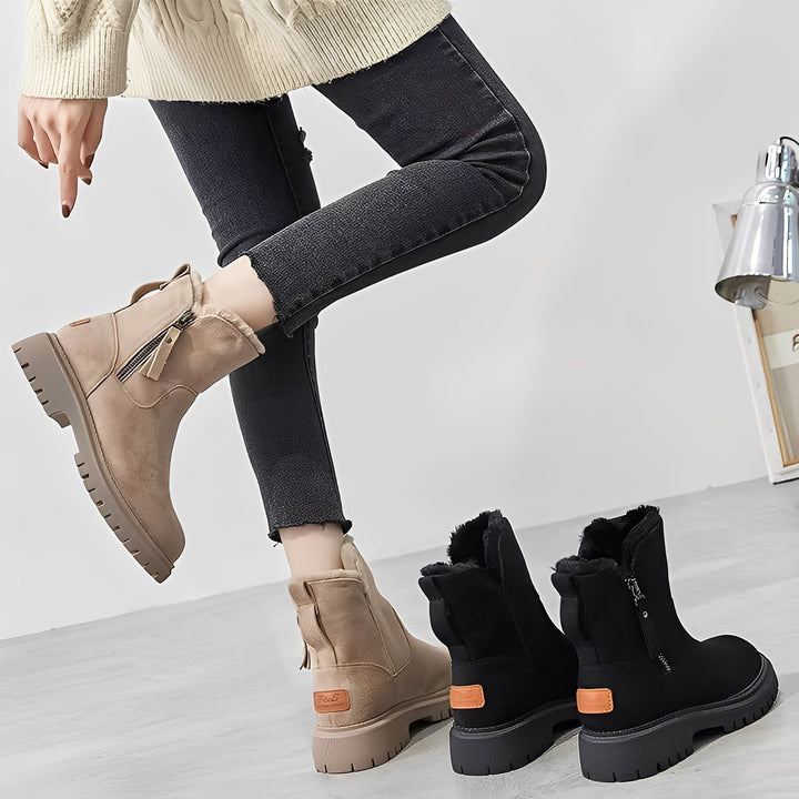 Eleganckie czarne botki damskie Raschelle. Stylowe, ocieplane buty zimowe dla kobiet.