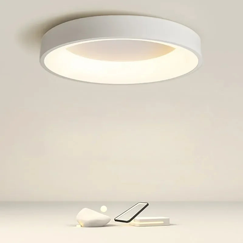 Okrągła lampa sufitowa LED w stylu nowoczesnym. Idealna do minimalistycznego oświetlenia wnętrz.