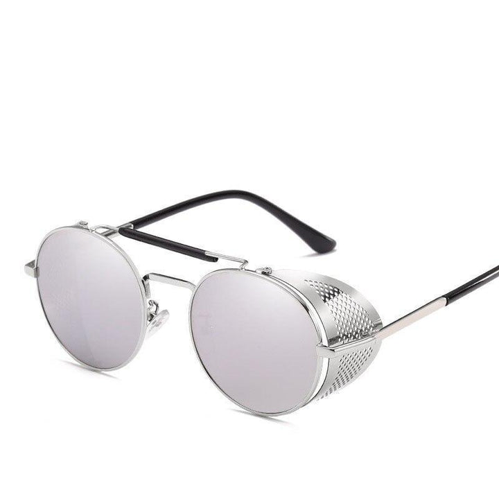 Modne okrągłe okulary przeciwsłoneczne retro uniseks. Dodaj stylu letnim stylizacjom. Akcesoria z ochroną UV.
