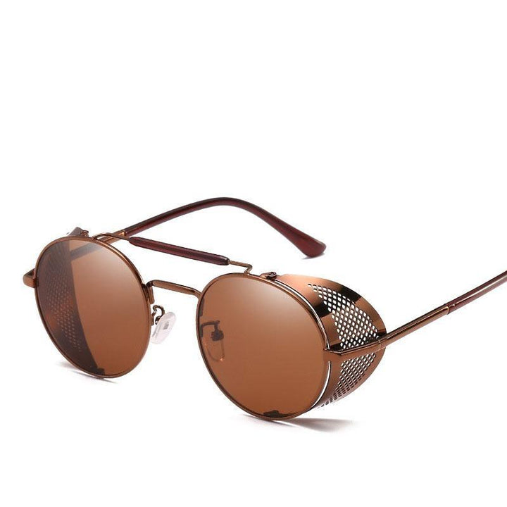 Okrągłe okulary przeciwsłoneczne uniseks, must-have lata. Modny akcent retro i 100% ochrona UV. Stylowe akcesoria.