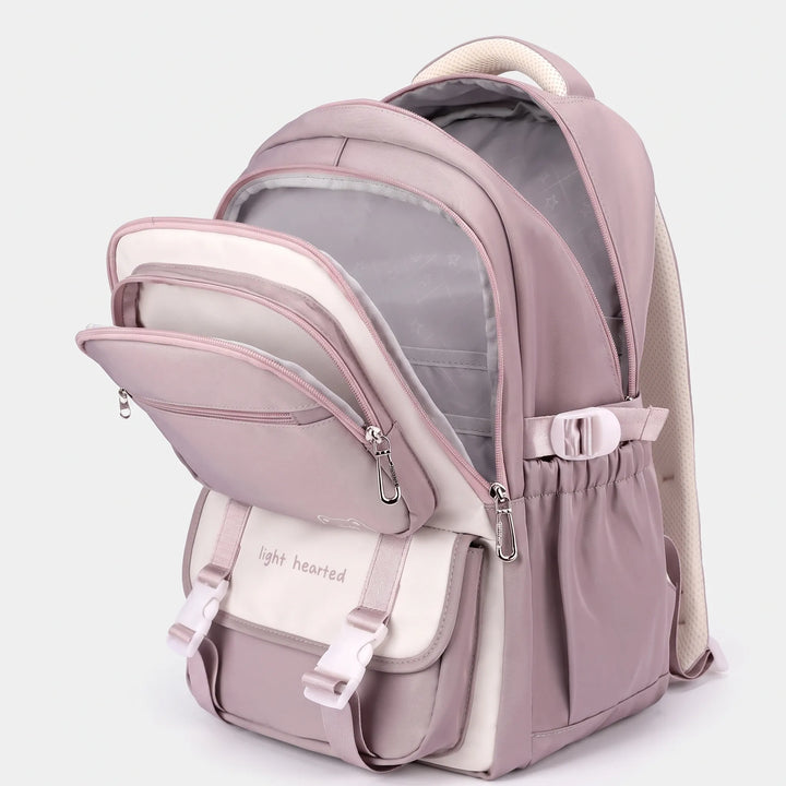 Trwały plecak szkolny unisex z materiału oxford, idealny do szkoły. Wielokieszeniowy, na książki i laptop.