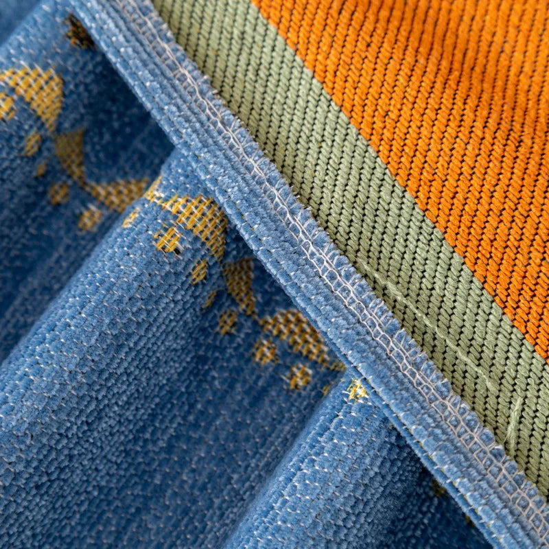 Miękki narzuta na kanapę boho z chenille. Skuteczna ochrona przed zwierzętami domowymi i plamami, dodaje stylu.