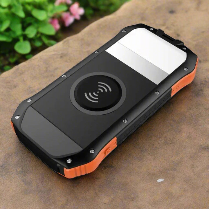 Kompaktowy power bank solarny z panelem, idealny na podróż i camping. Zapewnia energię w terenie.