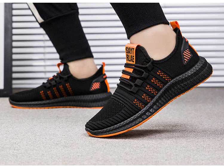 Stylowe buty do biegania męskie, czarne obuwie sportowe z żółtymi i pomarańczowymi akcentami