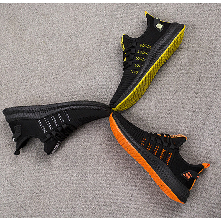 Obuwie treningowe męskie, widok z góry na czarne sneakersy sportowe