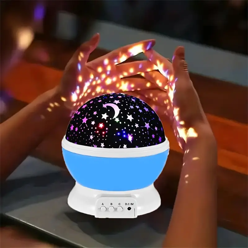 Projektor gwiazd LED dla dzieci, tworzący magiczną atmosferę w pokoju, idealny do zasypiania i zabawy.