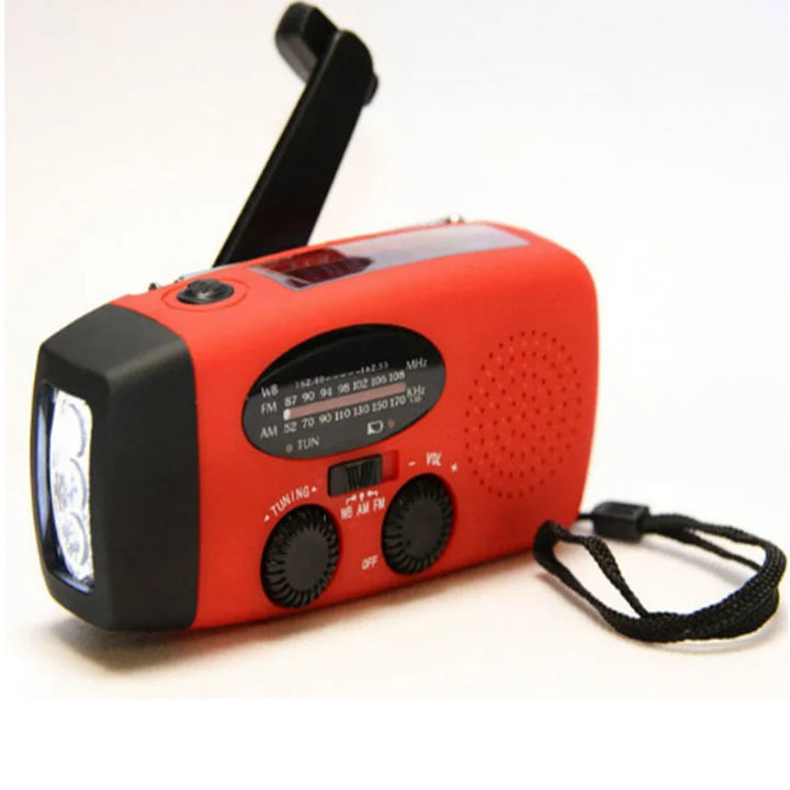 Kompaktowe radio survivalowe AM/FM z powerbankiem do ładowania smartfonów i jasną latarką LED na outdoor.