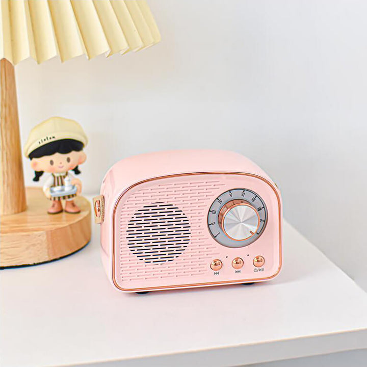 Stylowy głośnik retro Bluetooth, imitujący stare radio, z nowoczesnym dźwiękiem i kompaktową obudową.